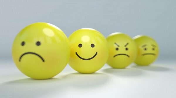 Image of yellow balls with different emoticon faces
