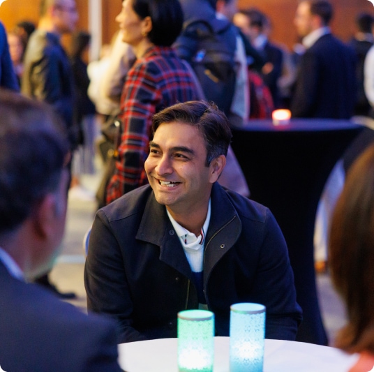 Man smiling at conference