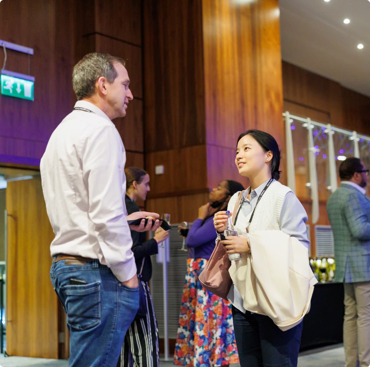 Conference attendees chatting