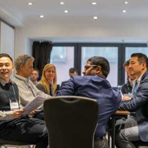 Event-7b6fd93f-b5af-4952-81f6-e9b81d6680be-041 SMS members in a meeting