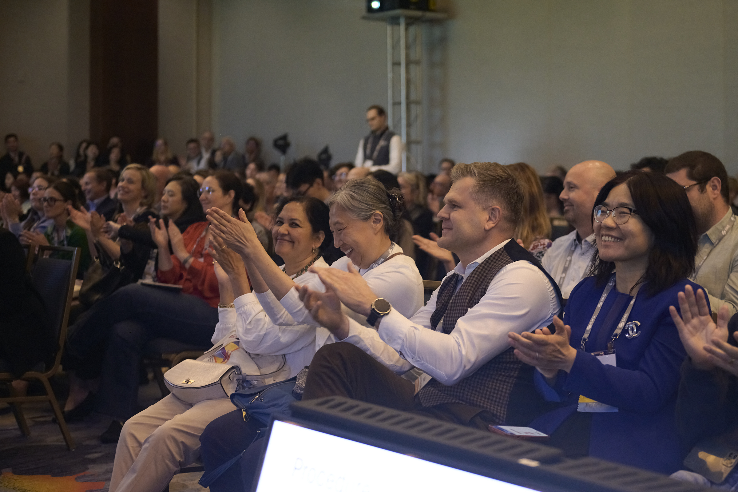 SMS members clapping