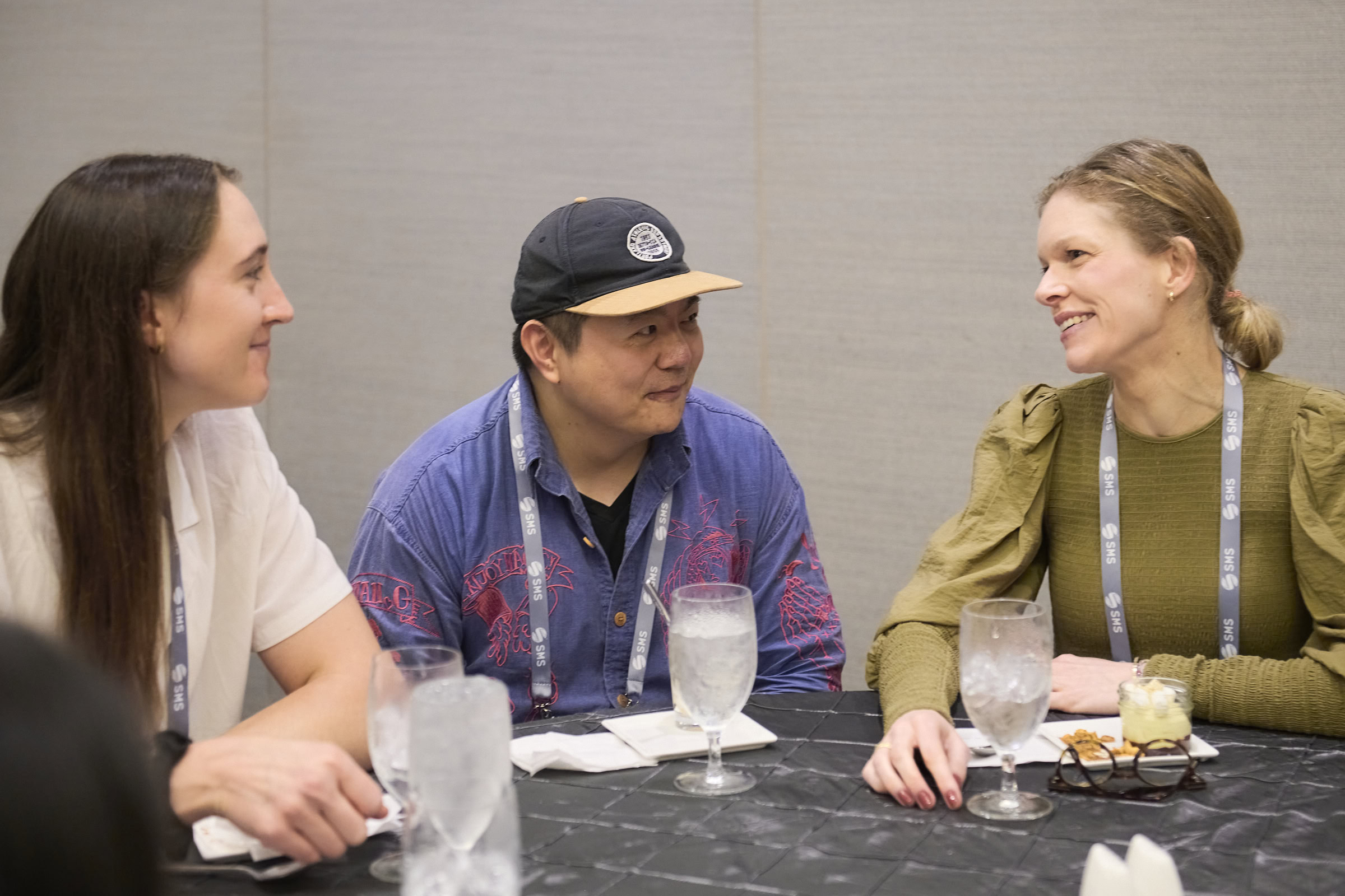 Three PhD students at lunch.